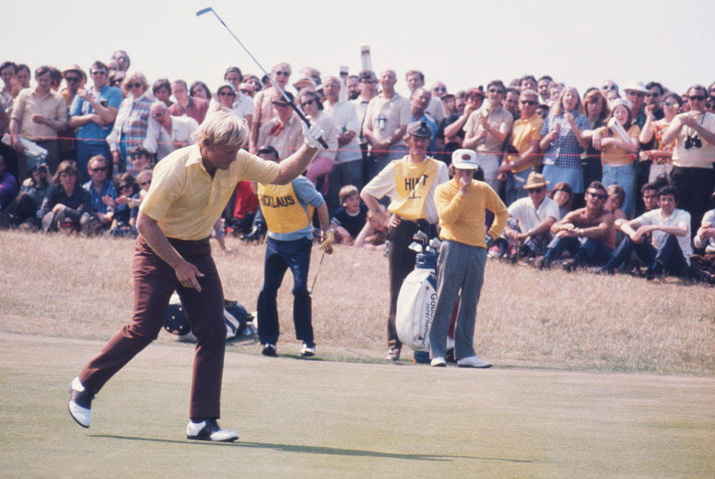 Jack Nicklaus celebrates holing a putt at Turnberry